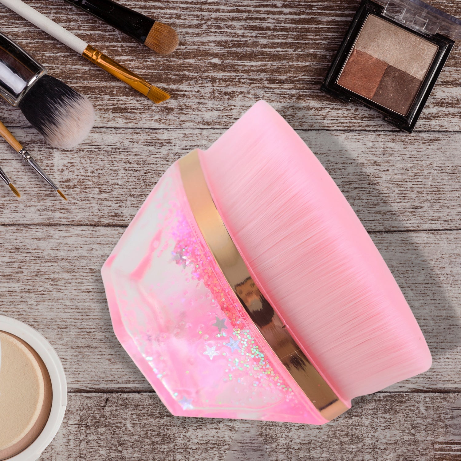 Close-up of glitter cosmetic brush showing starry gel base and soft bristles