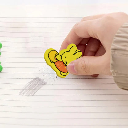 Collection of colorful cartoon erasers, showcasing diverse designs.