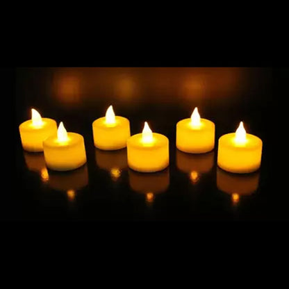 Group of white flameless LED tealight candles, perfect for creating ambiance.