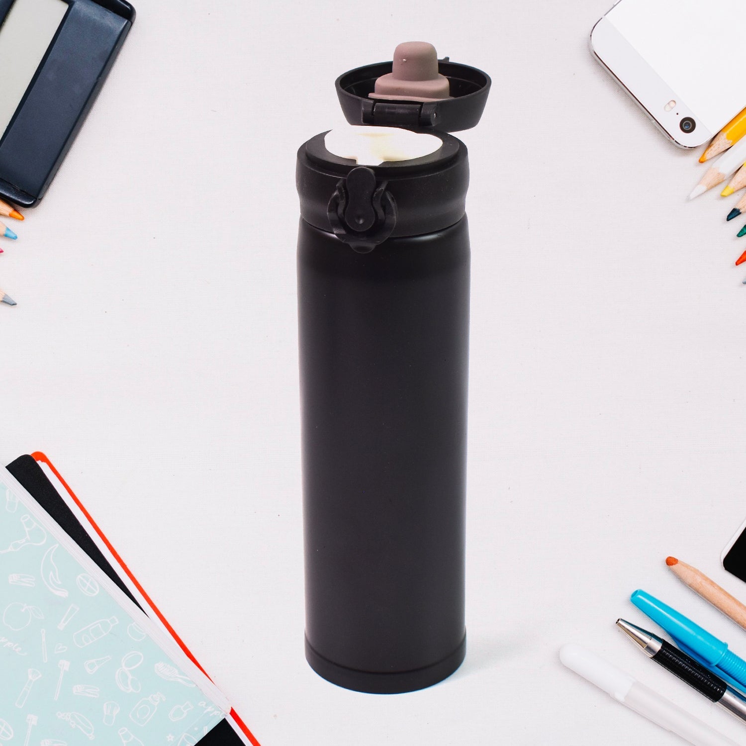Stainless steel insulated water bottle for kids, displayed against a bright background.