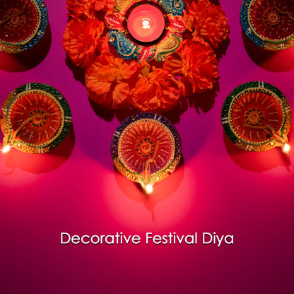 Beautiful leaf-patterned hand-painted clay diya, adding a natural touch to your decor.