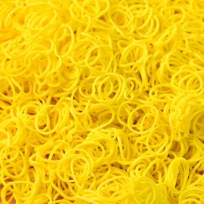 Elastic rubber bands laid out on surface showcasing durability