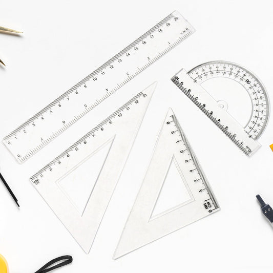 Clear plastic 4-piece geometry set including triangle ruler and protractor with precise measurements
