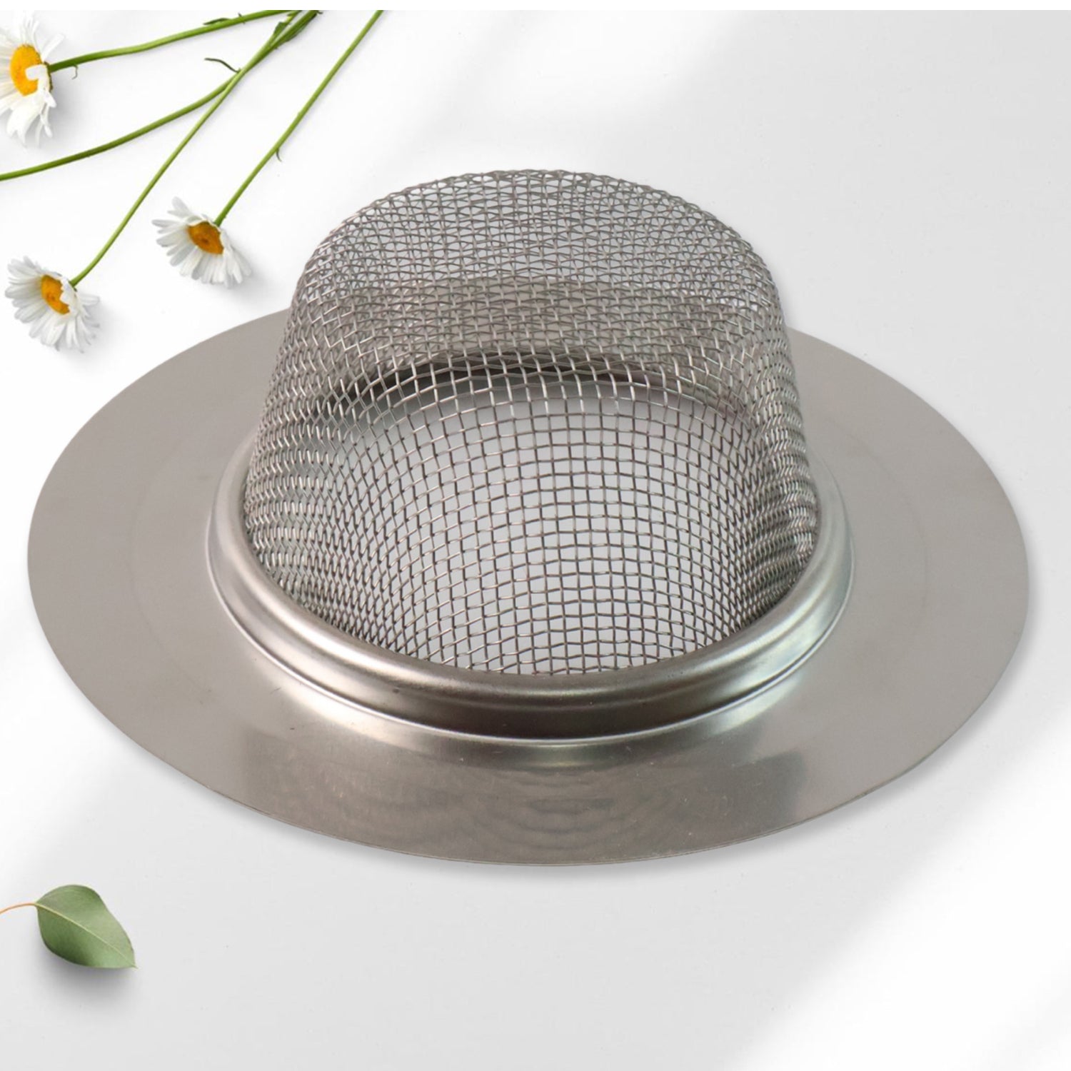 Fine mesh dome hair catcher trapping hair and debris
