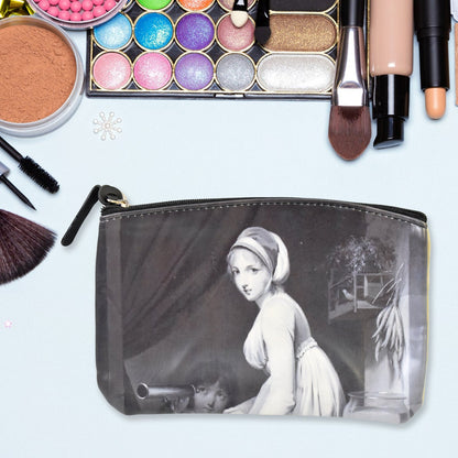 Organivo Portable Storage Bag holding small items like pens and cards.