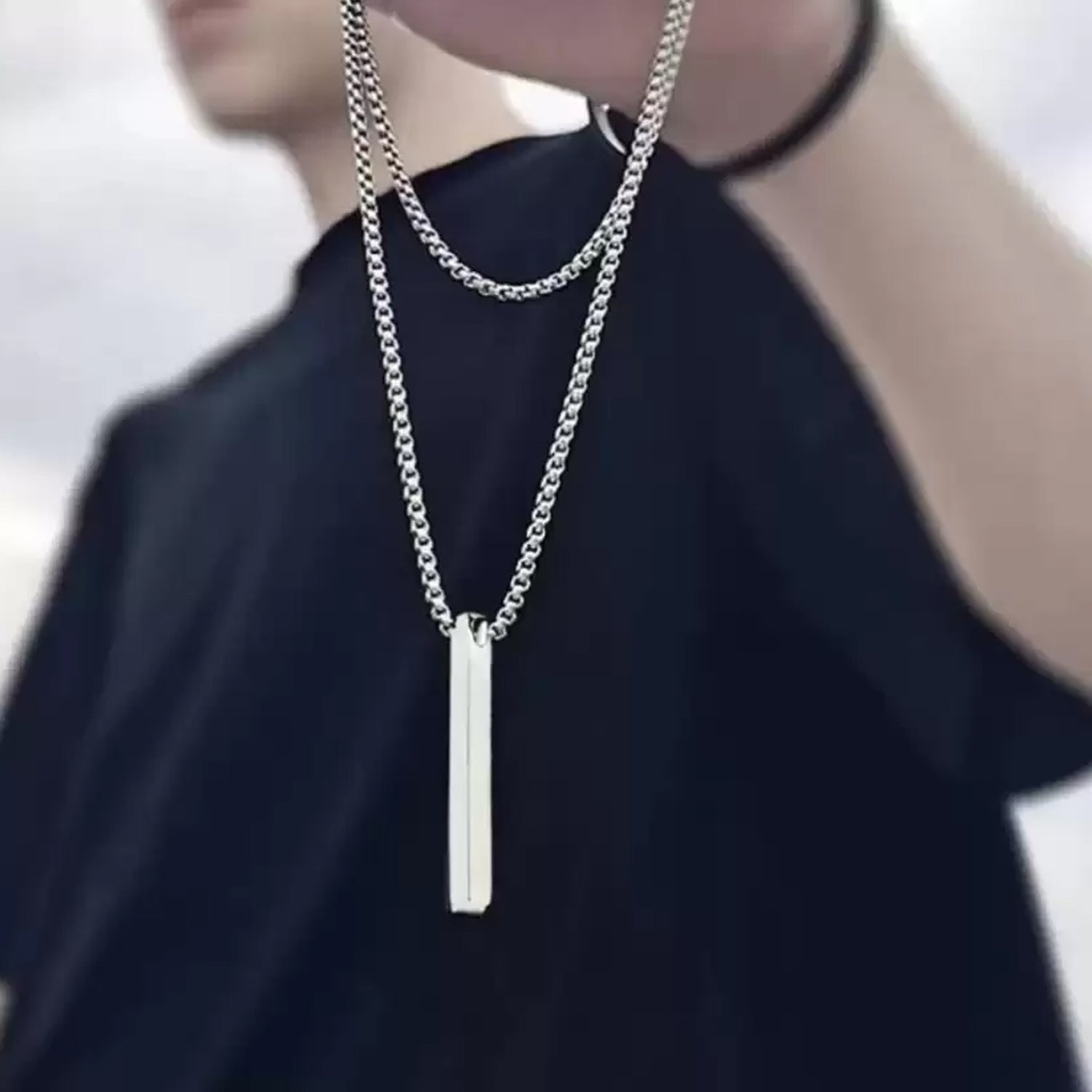 Side view of the elegant stick pendant stainless steel necklace.