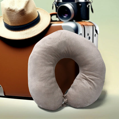 The Travel Neck Pillow displayed in a home setting, suitable for reading or watching TV.