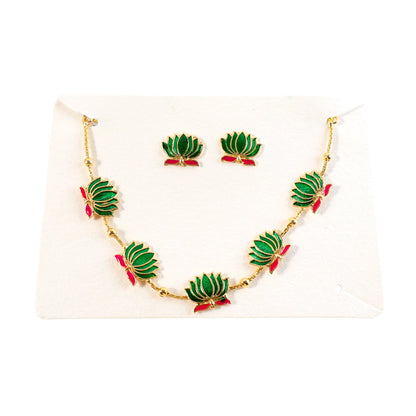 Gold-tone necklace with intricate green lotus enamel charms and matching earrings