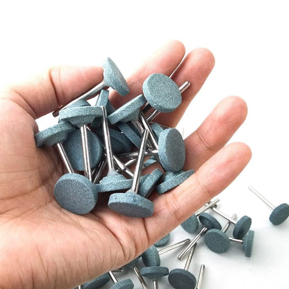 Various rotary tool accessories including the Grinding Head Mounted Stone set.
