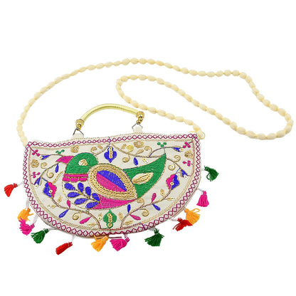 Elegant ethnic shoulder bag with traditional Rajasthani mirror work and tassels.
