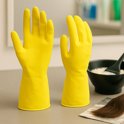 Person using yellow rubber gloves for bathroom cleaning.