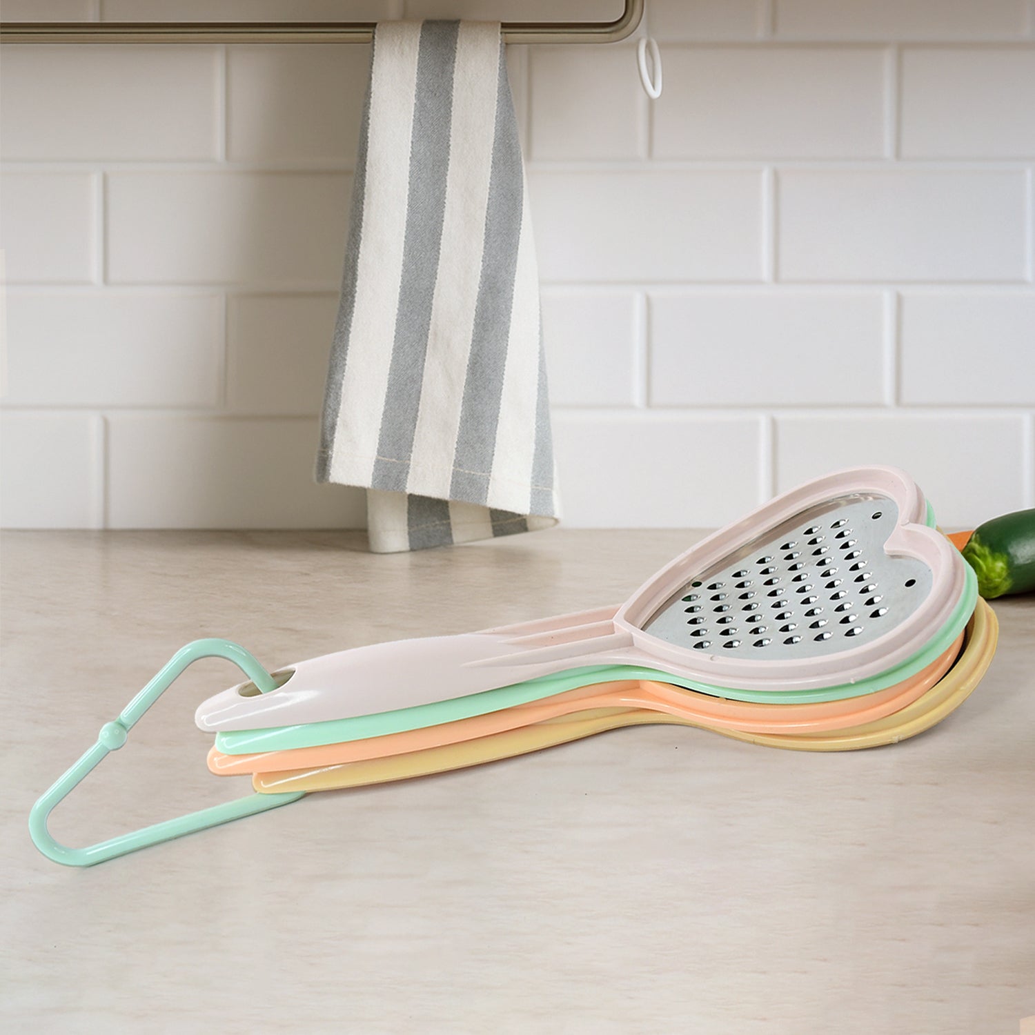 Detailed view of the durable plastic outline and steel blades of the Home Chef heart kitchen tool.