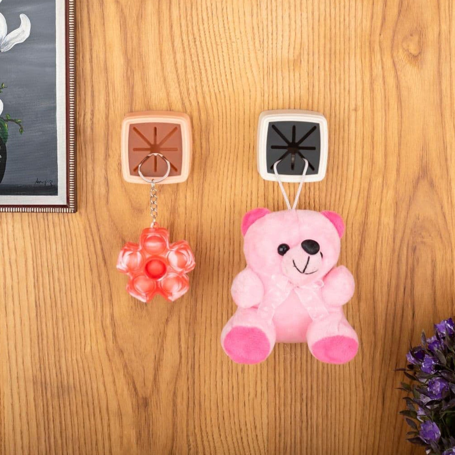 Multiple angles of the functional bathroom organizer, a 4-piece towel holder set.