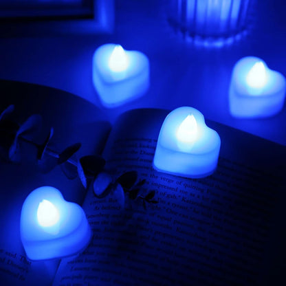 A single flickering LED tealight candle providing a warm, inviting glow.