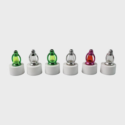 Battery-operated LED candle lights with decorative lantern-style covers