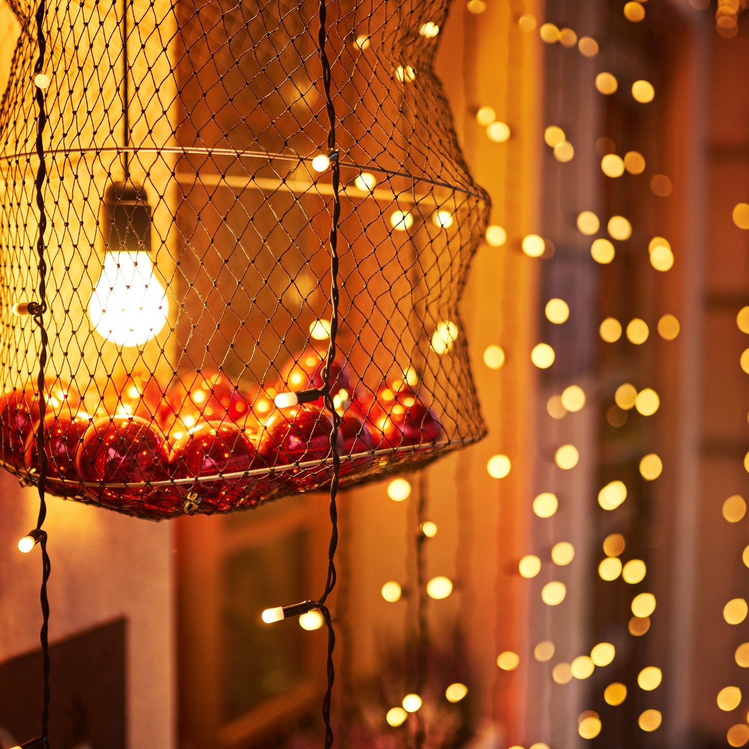 Long 9-meter multi-color LED string lights adding sparkle to a home setting.