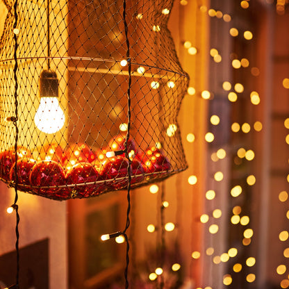 Long 9-meter multi-color LED string lights adding sparkle to a home setting.