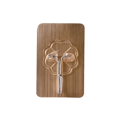 Seamless transparent utility hook mounted on wall resistant to water and oil