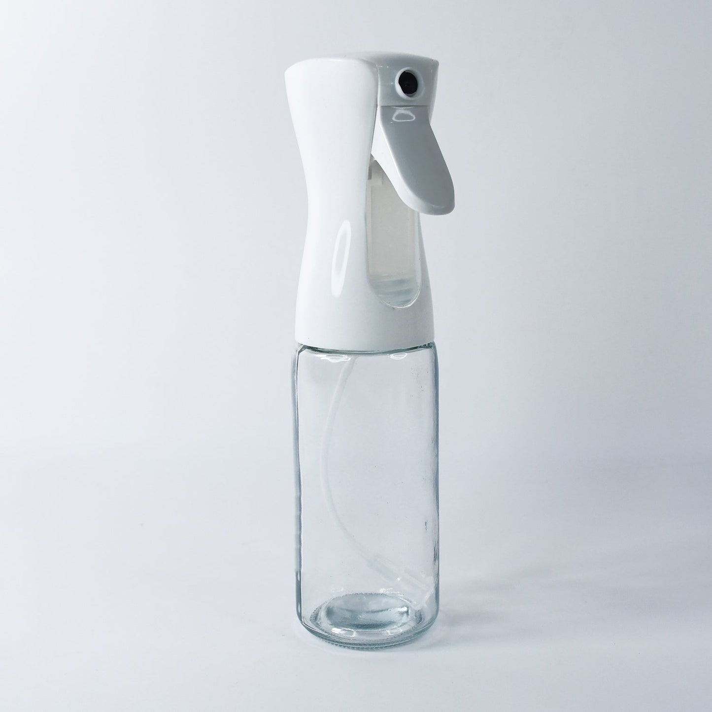 Versatile glass oil sprayer demonstrating its compact design.
