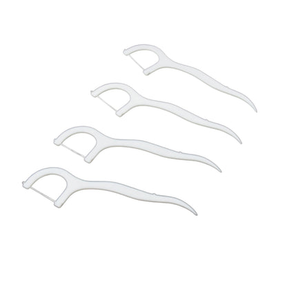 A 50-piece set of MintGuard Portable Dental Floss Picks spread out from their case.