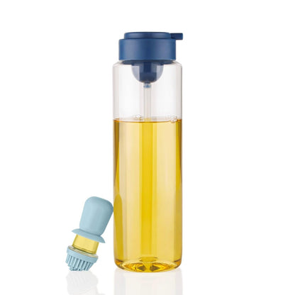 Transparent kitchen oil dispenser bottle, clearly showing the oil level inside, ready for use.