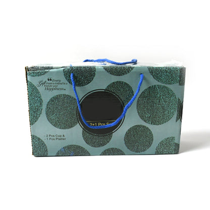 The complete 3-piece ceramic tea cup set with platter displayed on a wooden table.