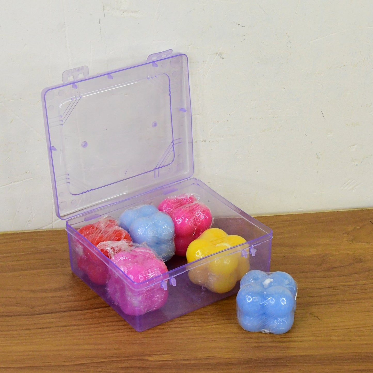 Colorful bubble cube wax candles packaged in clear gift box for special occasions