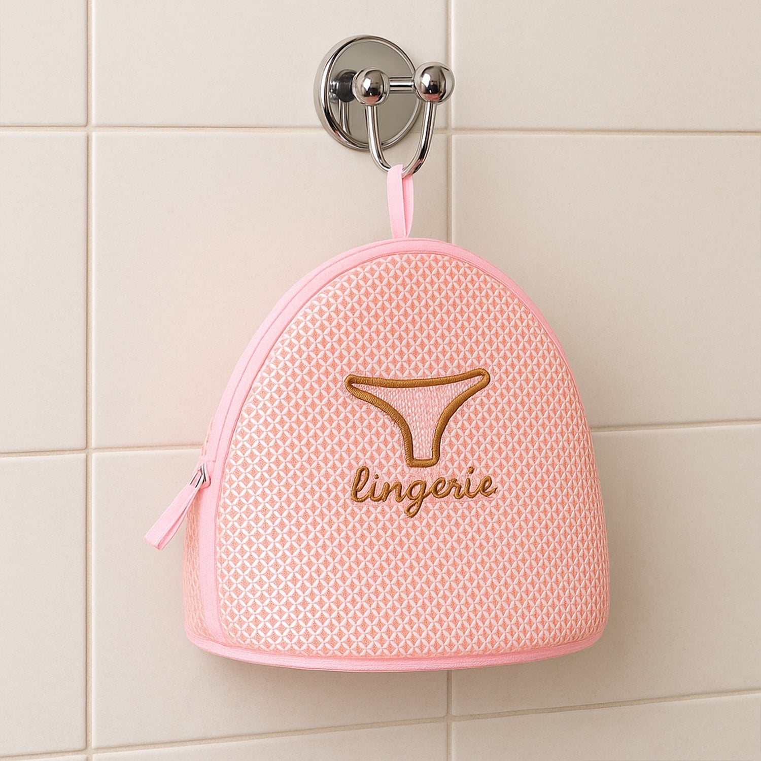 Multiple delicate items, including bras and underwear, safely inside a mesh laundry bag.