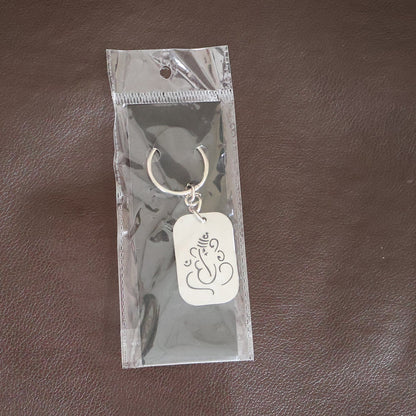 Back view of the Ganesh Metal Keychain, showing its smooth edges and premium finish.