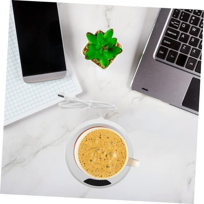 The USB mug warmer packaging, highlighting its features and portability.