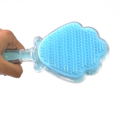 Top-down view of a colorful kids' detangling hair brush, perfect for making hair care fun.