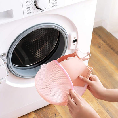 Protective laundry pouch with padded dome shape and zipper safety cover