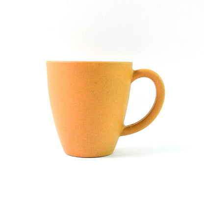 Two Konvex drinking mugs in a modern kitchen setting