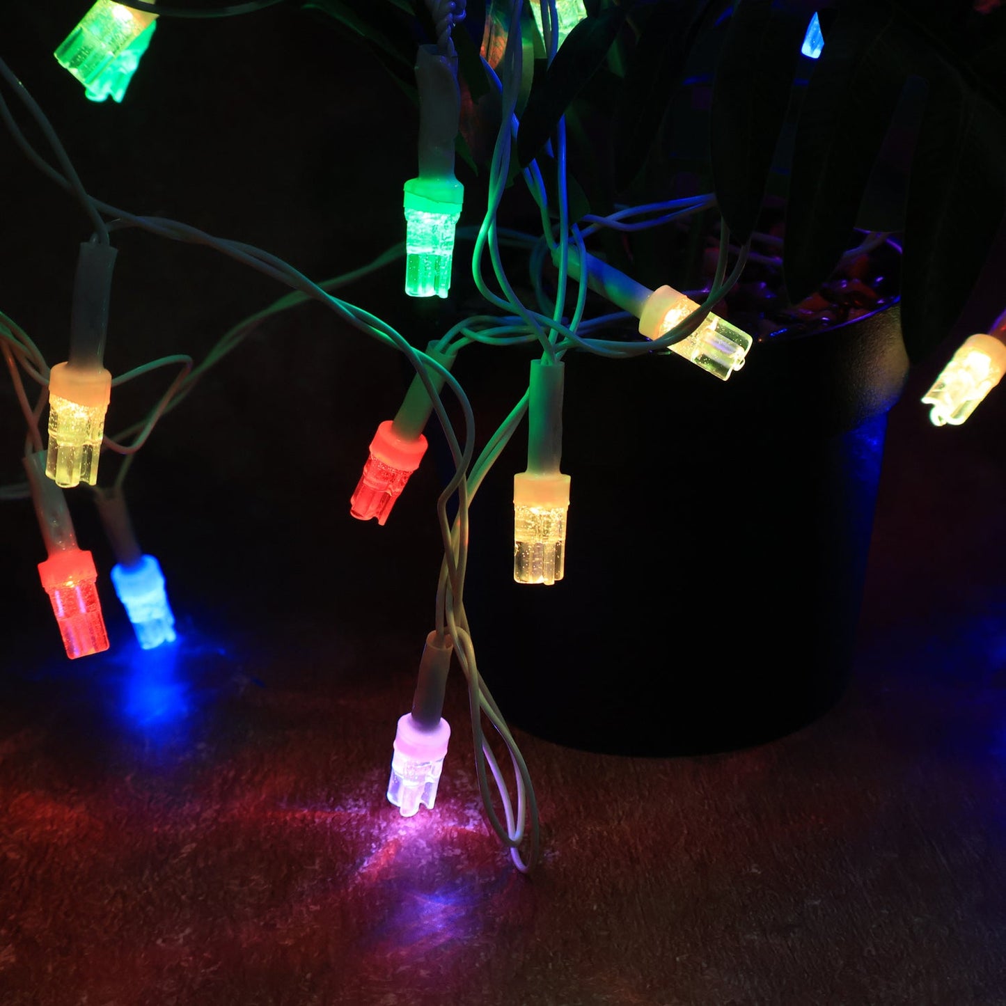 Multi-color LED decorative string fairy lights showcasing red, blue, green, and pink hues