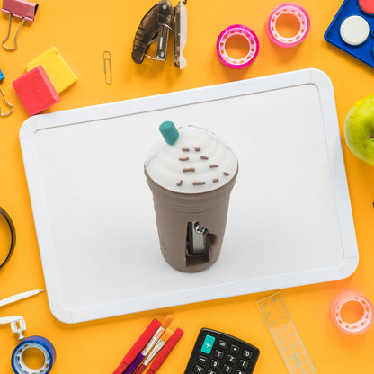 Side profile of the coffee-shaped manual pencil sharpener.