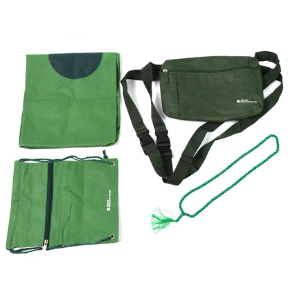 An overhead shot showcasing all components of the Umrah essentials kit, neatly arranged.