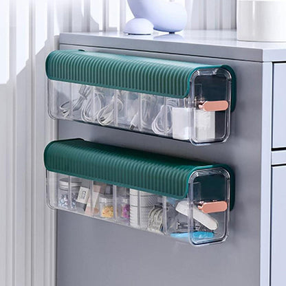The multi-purpose 5-cell wall mount drawer organizer storing various small accessories.