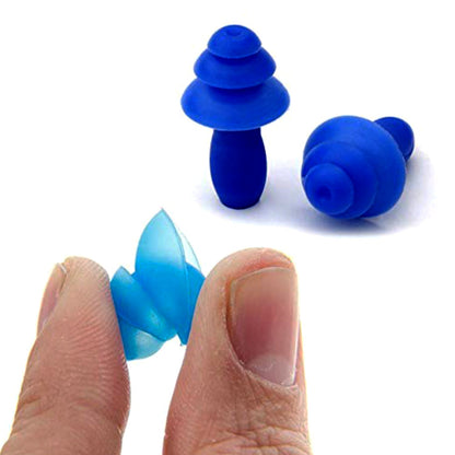 Close-up of an XcelSafe foam ear plug, highlighting its soft, pliable texture and ergonomic shape.
