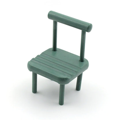 The wooden Mini Chair Phone Stand displayed from a different angle, showcasing its cute design.