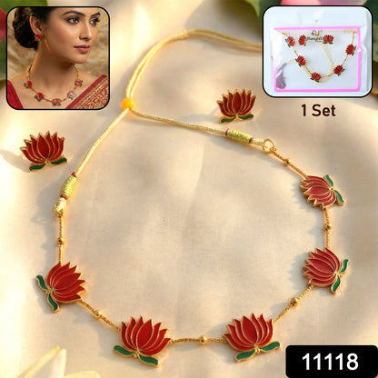 Close-up of red lotus designed necklace highlighting intricate motifs