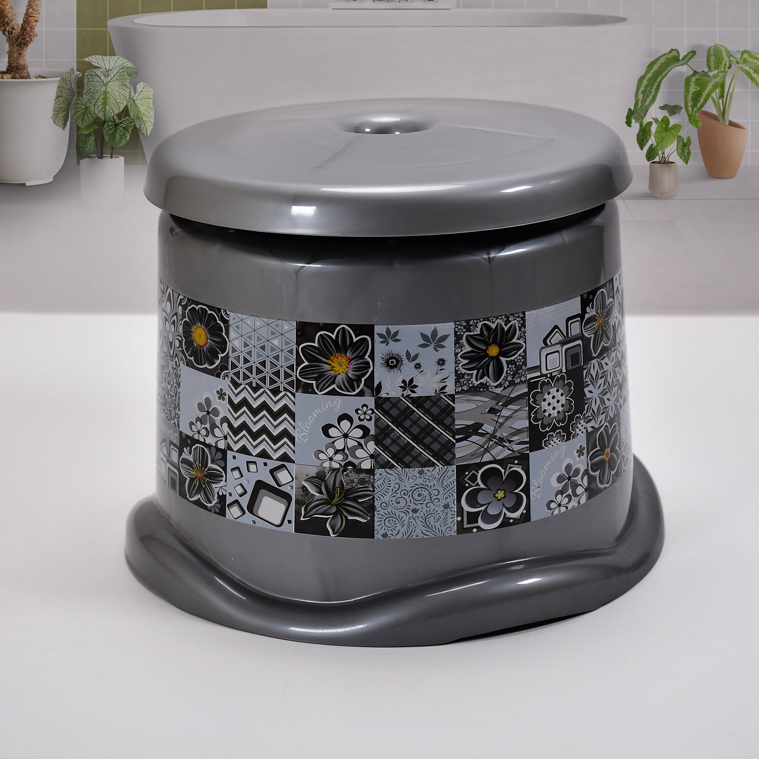 Various items from the 7-piece bathroom set, including the dustbin and stool, for a comprehensive solution.