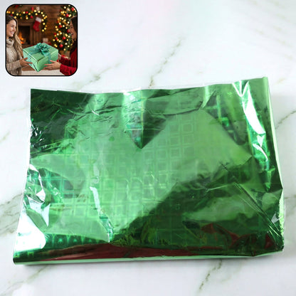 Metallic gift wrap sheets styled with ribbon and gift box decoration