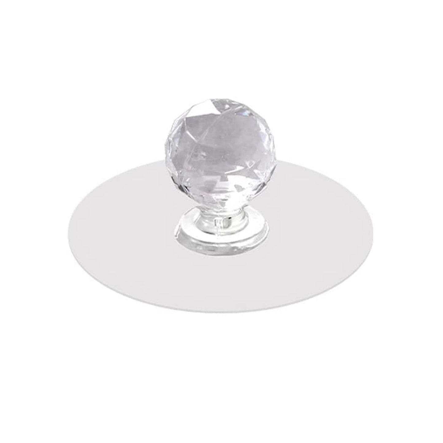 Crystal cabinet knob elegantly installed on a light wooden drawer for a modern look.