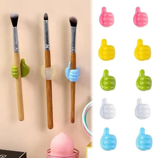 Colorful WipeTech cable clips organizing wires on a desk.