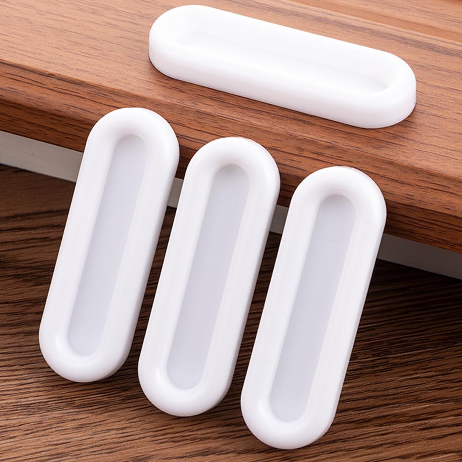 Self stick push pull helpers showing sleek design and strong adhesive backing