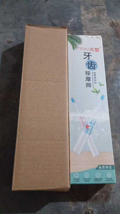 Hand holding the slim Battery-Operated Electric Toothbrush for daily use.