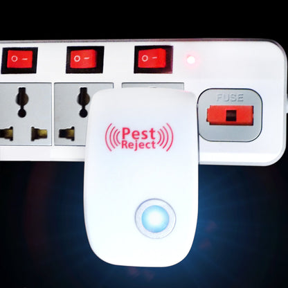 Ultrasonic pest repeller device with LED indicator on a clean surface.