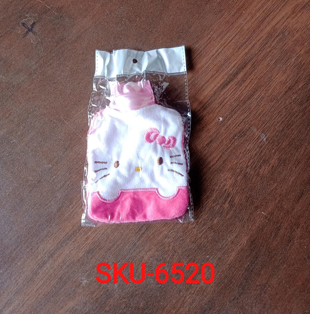 Pink hot water bag with cover, a cozy solution for warmth and pain relief.
