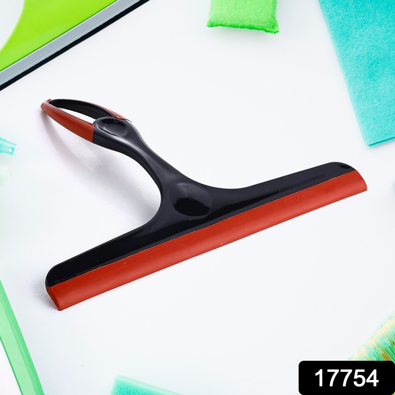 Ergonomic kitchen wiper effortlessly cleaning a glass window for a sparkling finish.
