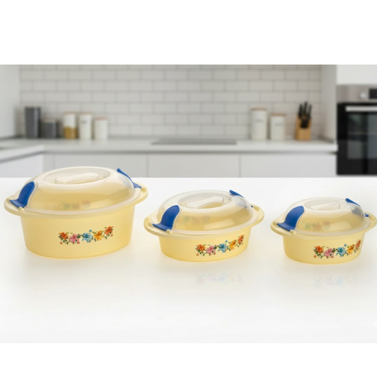Three multicolour insulated casserole dishes with chrome accents, ideal for keeping food warm.